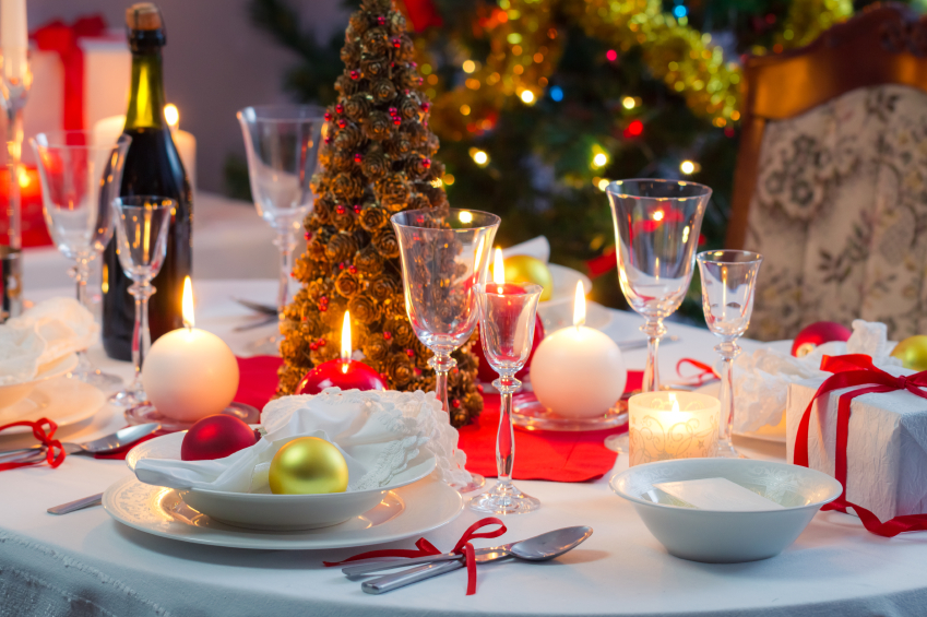 Preparing for Christmas Eve at beautifully decorated table