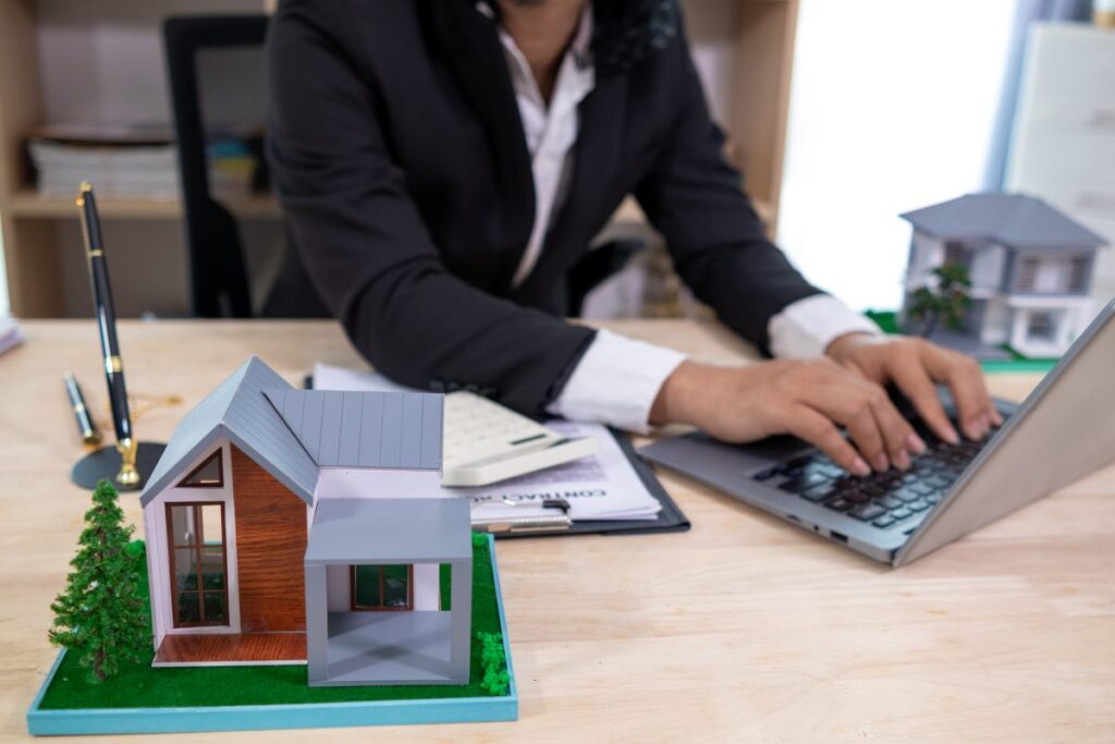 Real estate businessman or broker is calculating interest rate based on period of time that the client wants to use in deciding to make a contract to buy a real estate