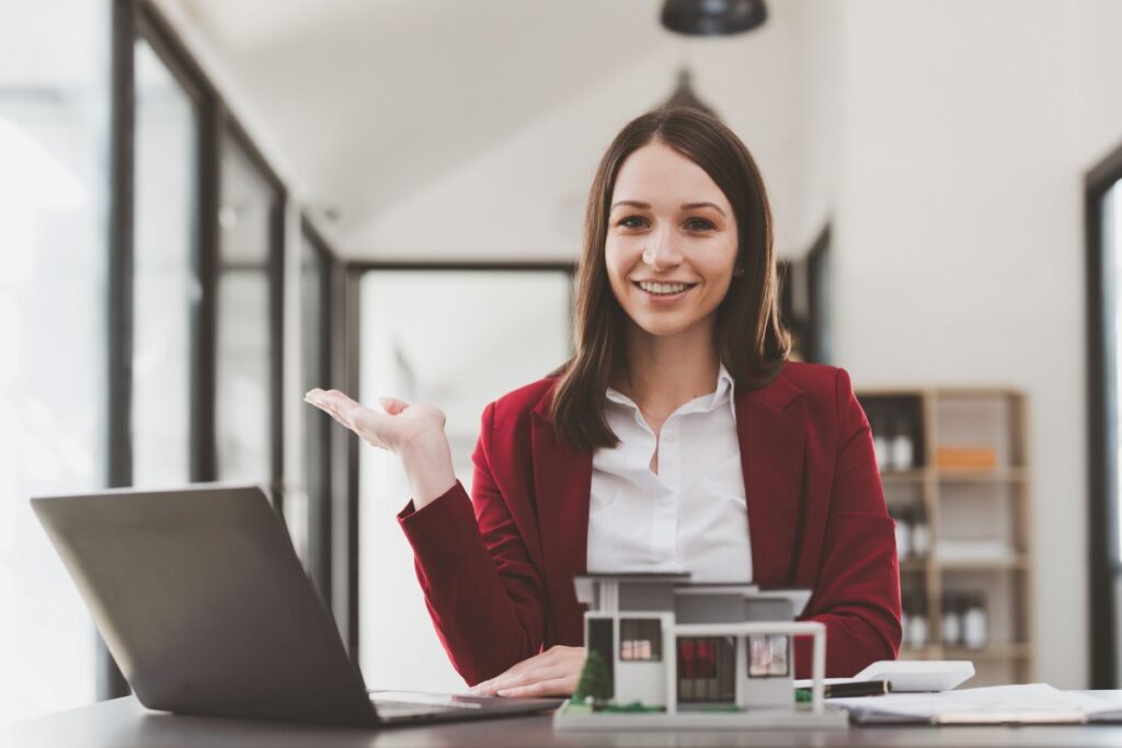 Business person or Real Estate agent explain signing agreement for buying house