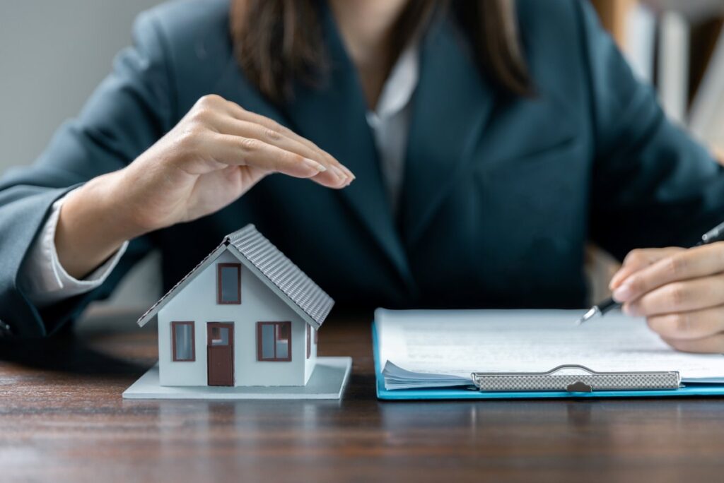 Banks approve loans to buy homes. Real estate agents explain the document for customers who come to contact to buy a house, buy or sell real estate concept