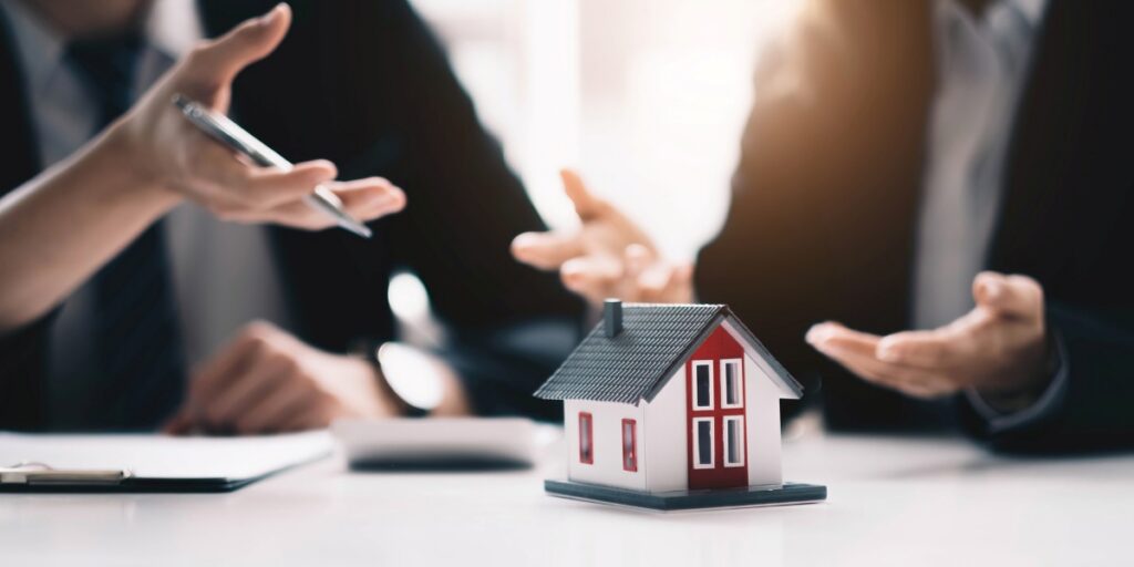 two people talking about house sale