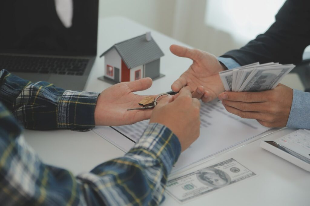 Real estate agent and customer signing contract to buy house, insurance or loan real estate