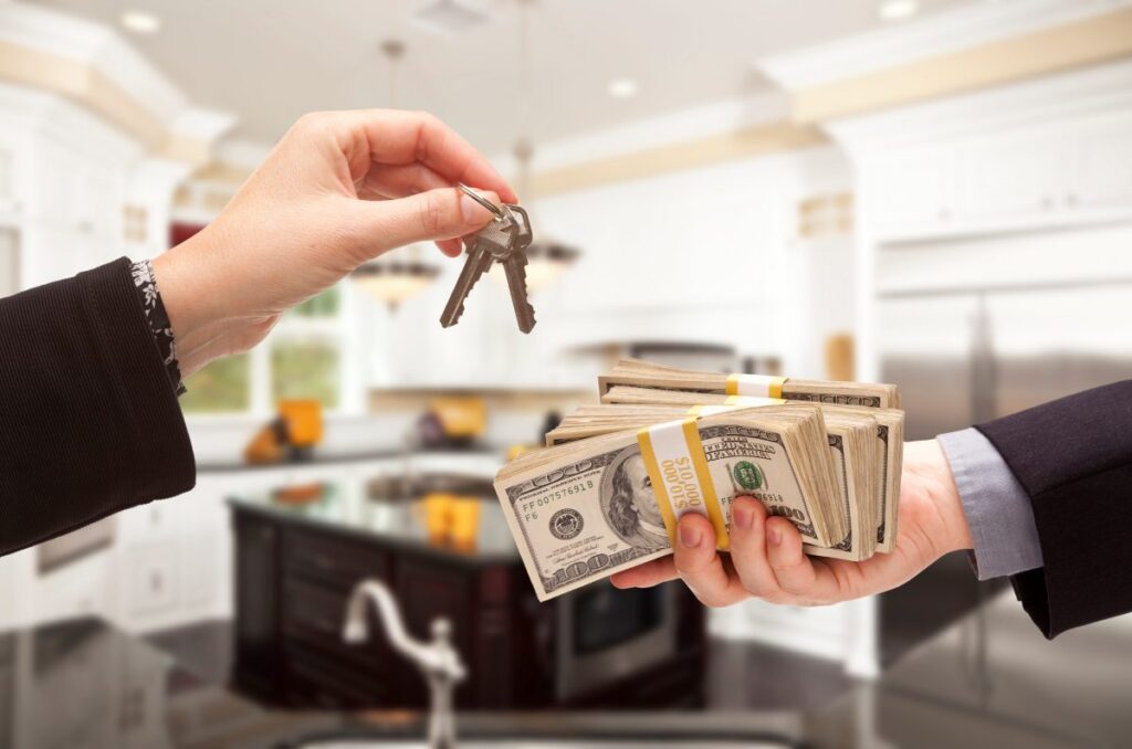 Handing Over Cash for Keys Inside Beautiful Home